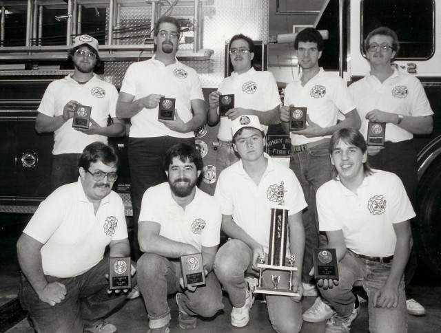 1988 New Holland Fair Tug-O-War Champions. Kneeling: Barry Plank, Ted Ford, Rick Diehm, Keith Romig. Standing: Scott Miller, Smoke Hayes, Chuck Plank, Marvin Stoltzfus, Jim Plank